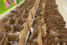 Brown paper bags filled with meals