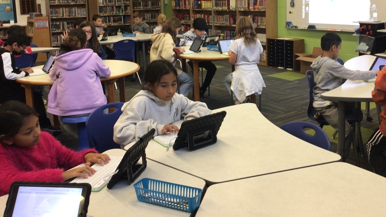 Students learning keyboarding during Library time 