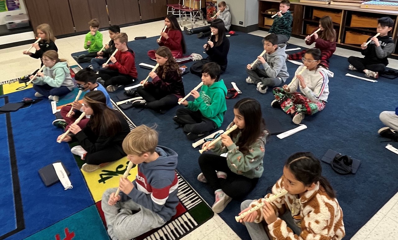 Mrs. Pennell&#39;s class playing the recorder during Music class