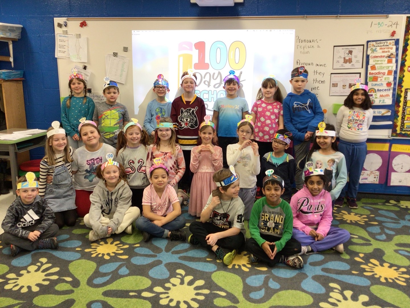 Students posing on the 100th day of school.